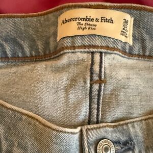 NWT faded Jean. Size 36 22R zipper front with button closure